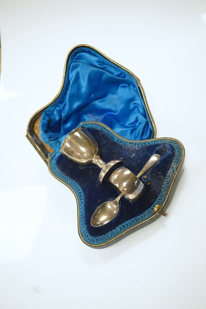 Five assorted cased silver sets including pair of horseshoe napkin rings, six bean end coffee spoons, two christening sets and a small serving spoon. Condition - fair